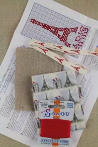 Contents of Sajou cross stitch embroidery kit - Eiffel tower case red