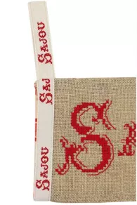 Detail of the finishing ribbon Sajou cross stitch kit red logo case