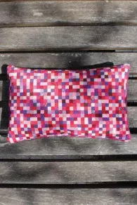 Sajou basketweave cushion in pink, red and mauve tones