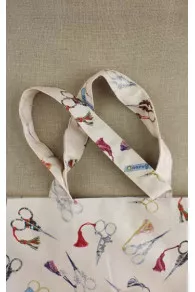 Détail des anses du petit sac à main à coudre Sajou ciseaux de broderie
