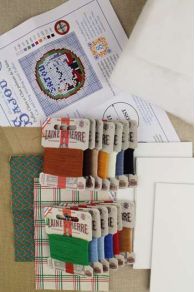Detailed contents of the Sajou Cat and Dog winding needlepoint kit to make stuffed puffies