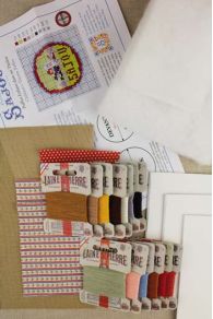 Detailed contents of the Sajou Children's Theatre needlepoint kit to make stuffed puffies