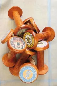 Collection of large Sajou industrial wooden waxing spools 