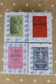 Quatre boîtes Atelier étiquettes Album Sajou