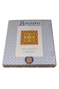 Presentation of the Sajou basketweave tapestry kit for Sauzet square cushion in yellow and green tones